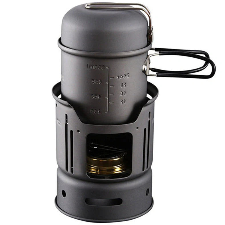 Small black stainless steel camping cookware set with alcohol stove and components