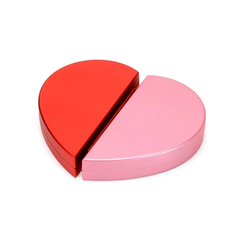 Red 3D heart-shaped rotating ring box with a rose flower decoration, open to show ring placement.