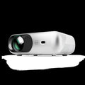 White portable WiFi HD 1080p projector with focus ring and remote control on a table