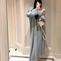 Women's grey knitted cardigan dress suit set with long skirt and flocking detail.