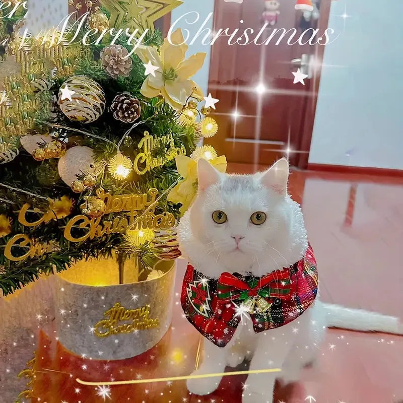 A red background festive bell design polyester scarf for a dog around its neck.