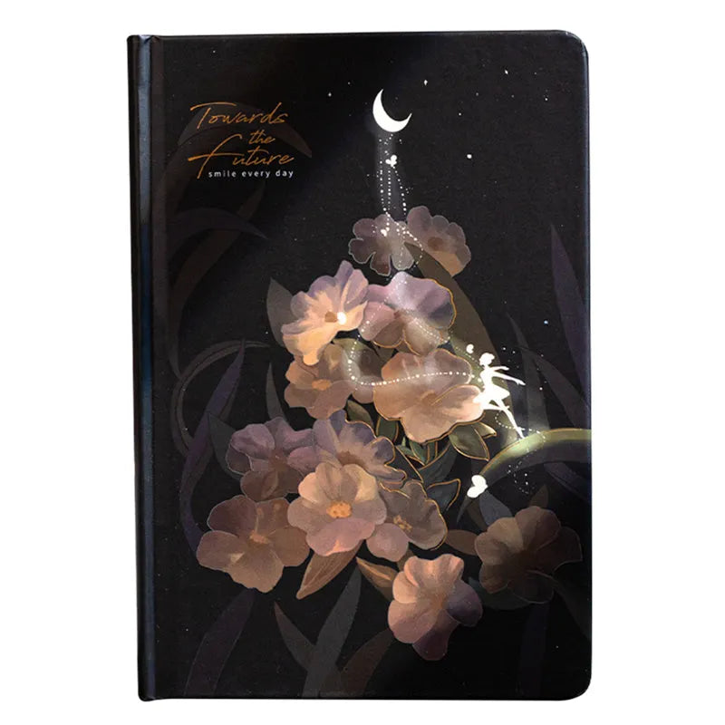 A5 notebook with luminous cover open to show colour illustration inside, in deep blue colour option.