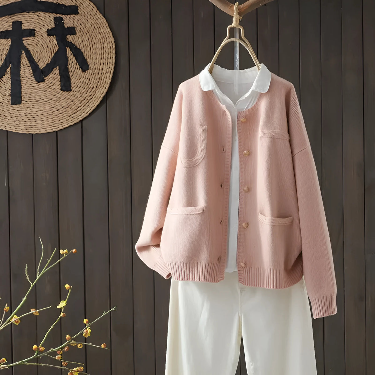 Long-sleeved knitted cardigan with button pocket, solid colour queen style, available in apricot, blue, and pink
