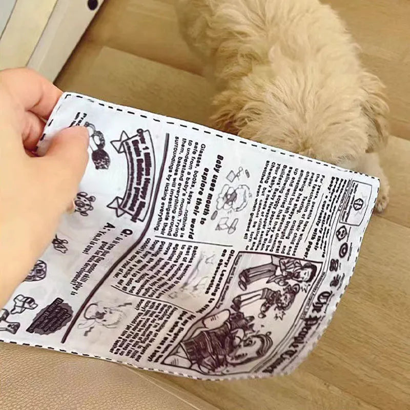 Tearproof pet dog toy with simulated squeaking newspaper playing cards for interactive play
