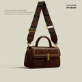 Brown retro messenger bag for women showing square vertical shape and external pocket