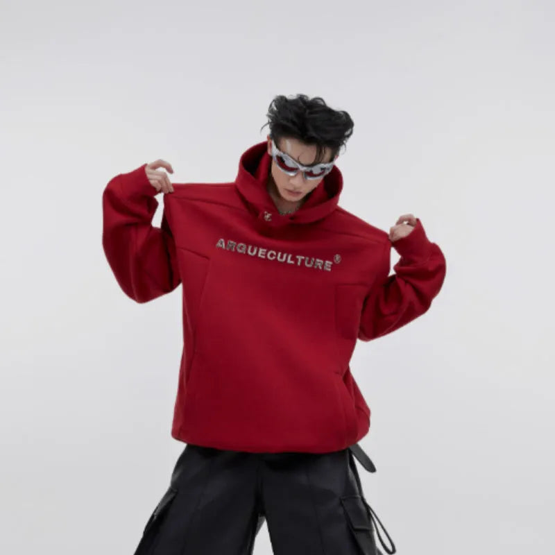 Men's loose red hooded sweater with heavy shoulder pads and raised three-dimensional printing pattern.