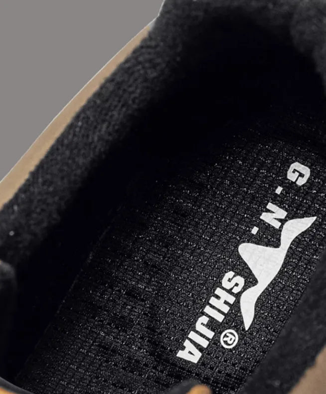 Black and white platform sneakers with thick rubber soles and microfiber leather insoles