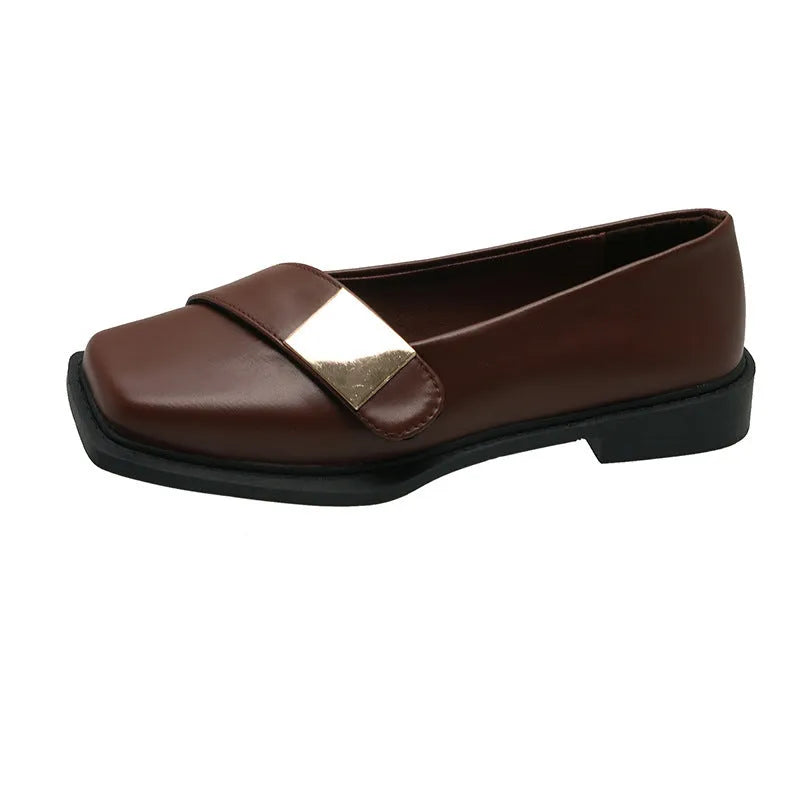 Beige women's square toe flat slip-on shoes with a metal buckle and low square heel.