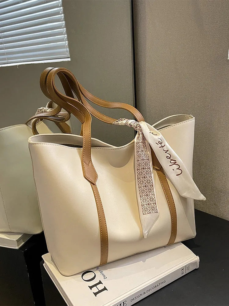 Women's large capacity tote shoulder bag in multiple colour options showing bucket design with sandwich pocket