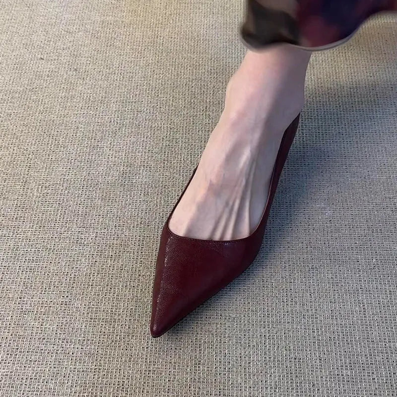Women's solid colour French pointed-toe mid heel cowhide pumps in black with stiletto heel