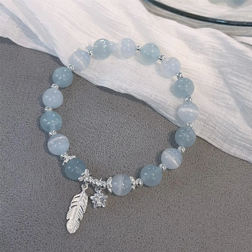 Korean style crystal bracelet with blue moonlight glass beads and eight pointed star charm