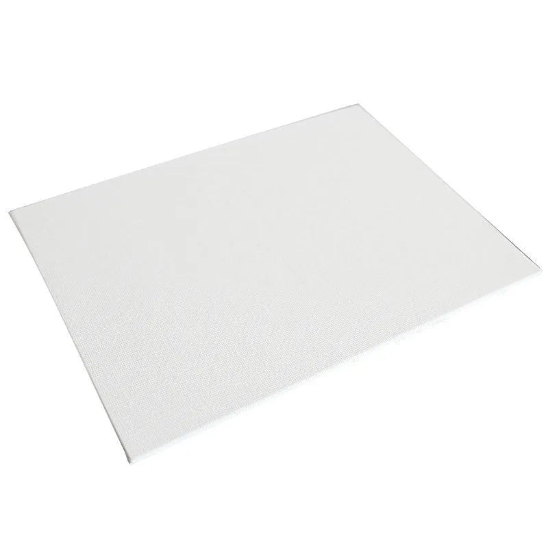 White primed cotton canvas panel oil painting board on flat surface