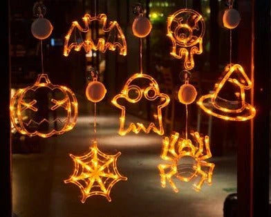 Spooky Halloween window hanging lights featuring pumpkins, spiders, and ghostly figures for a festive atmosphere