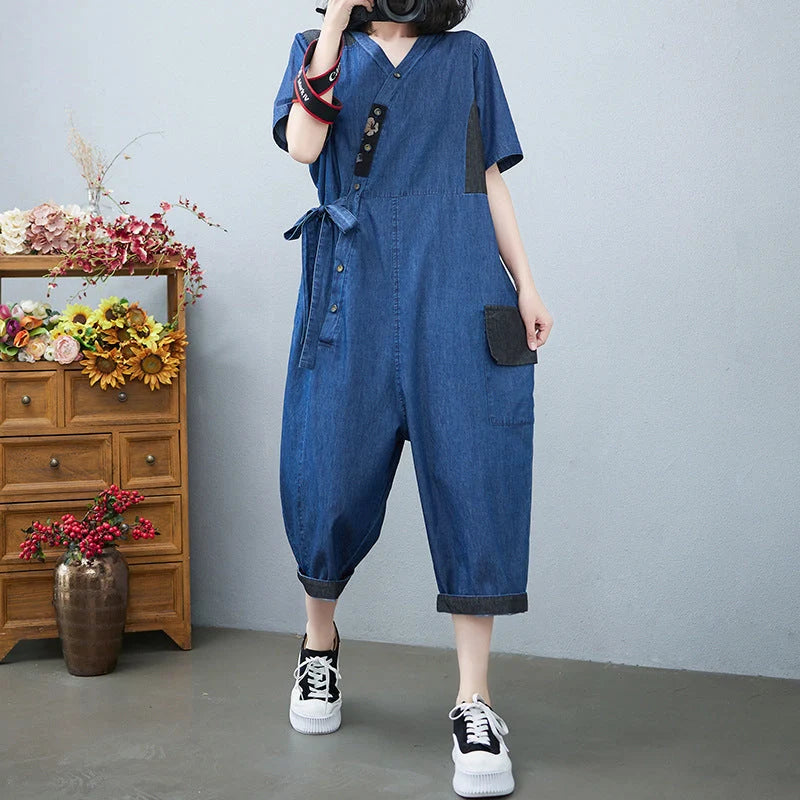 Women's Drawstring Denim Jumpsuit in blue and black with wide legs and cropped length
