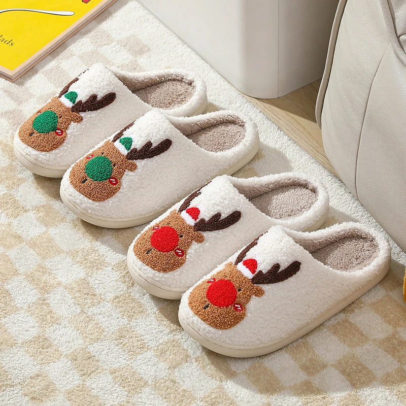 Cozy festive elk-themed slippers in red and green colors, featuring plush, soft materials for comfortable indoor wear