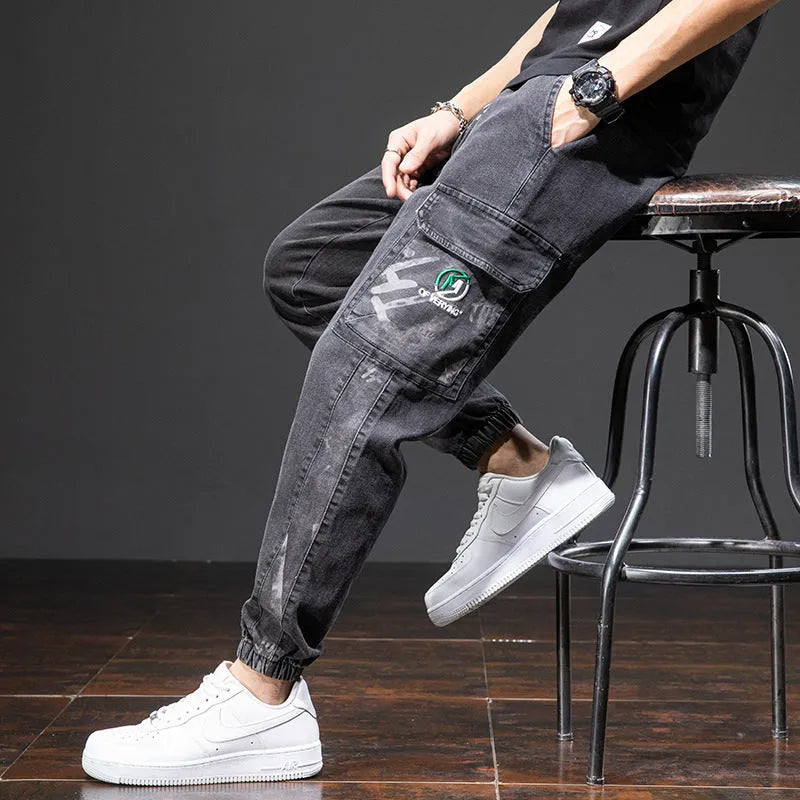 Men's loose fit cargo casual jeans in blue, showing straight leg and Korean style design.