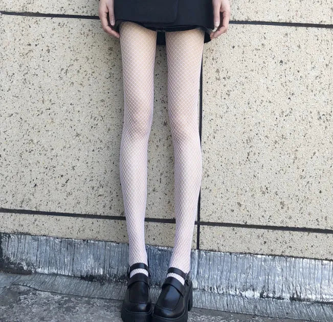 Women's mesh stockings showing large, medium and small mesh patterns in black and white