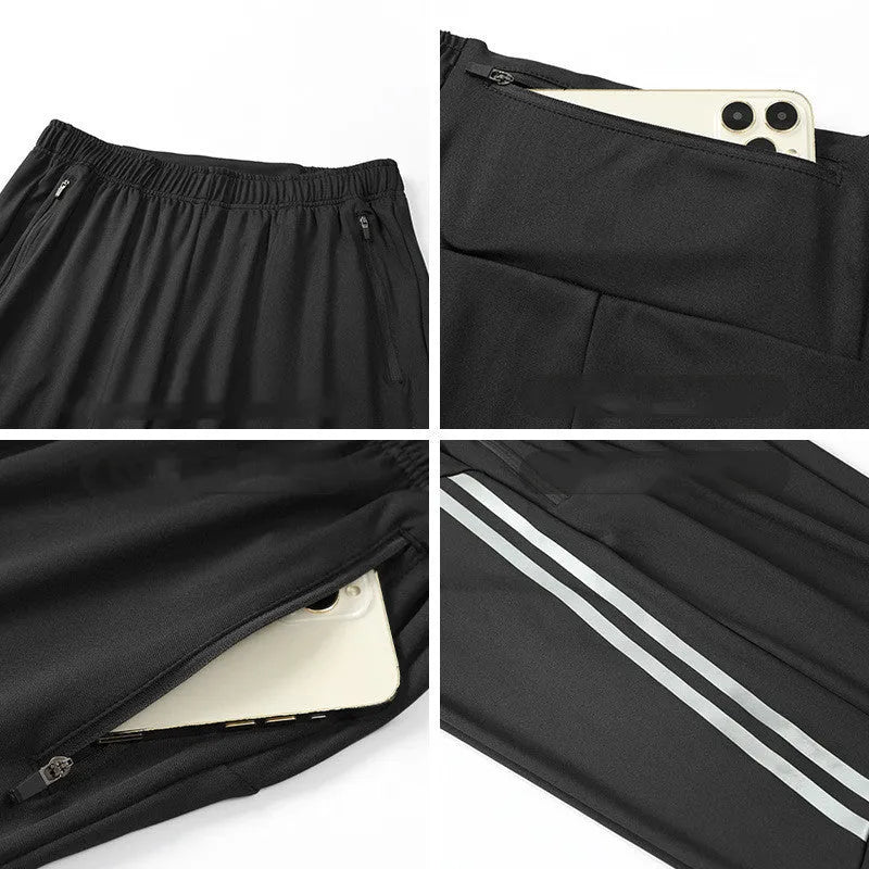 Men's black polyester running trousers with a mid-waist and full-length leg.