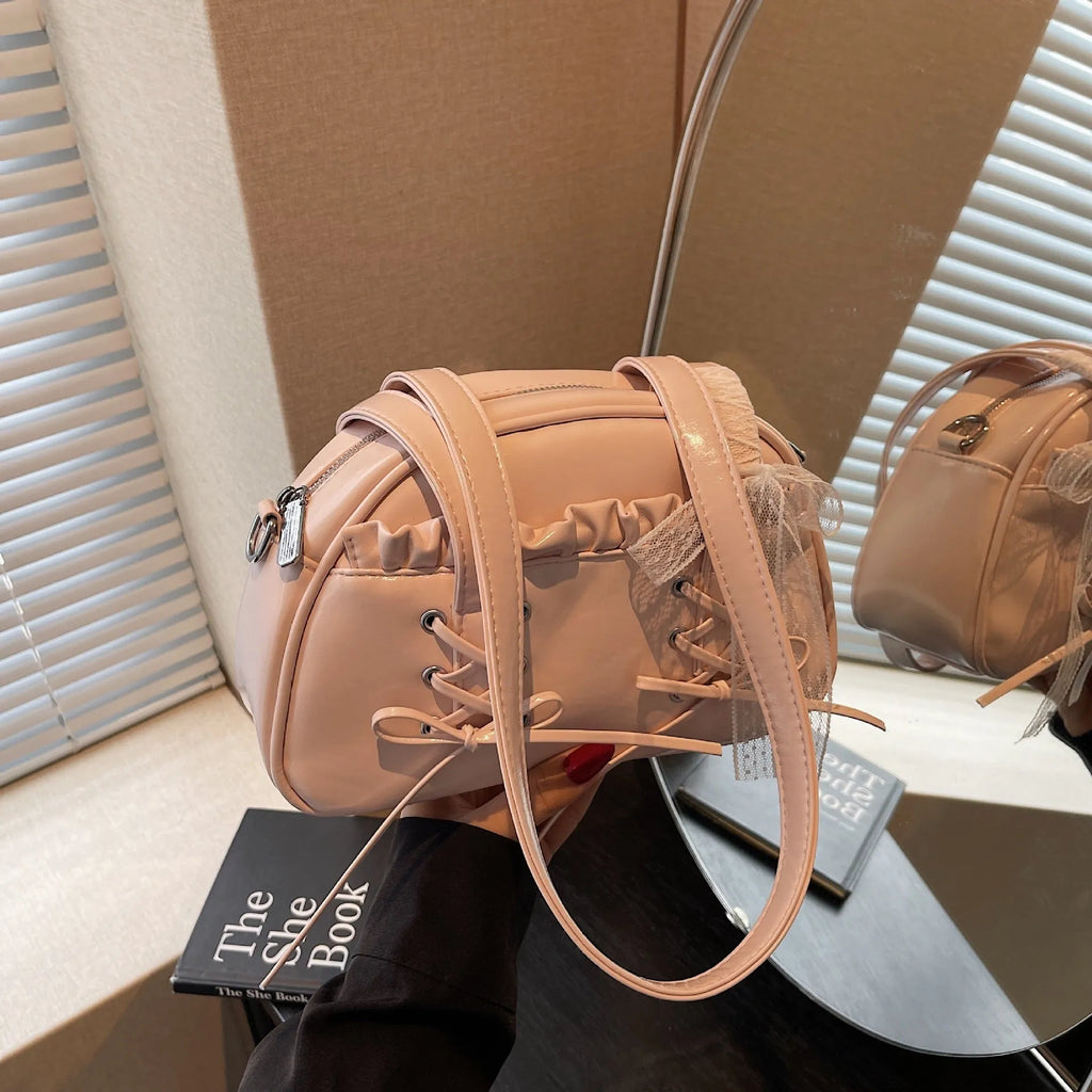 Women's casual PU bandage bow shoulder handbag with visible stitching, shown in milky white colour.