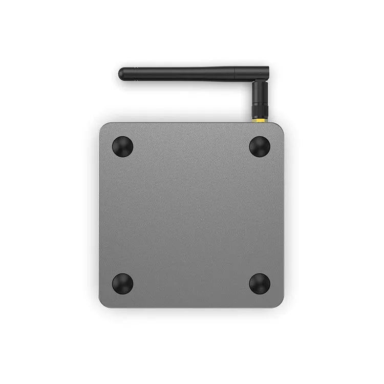 Android smart TV set-top box with remote control, HDMI cable and power adapter.