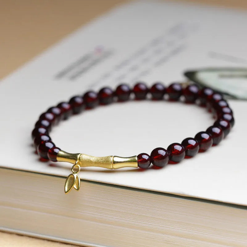 6mm garnet single ring bracelet with adjustable bamboo joint clasp in copper or silver finish
