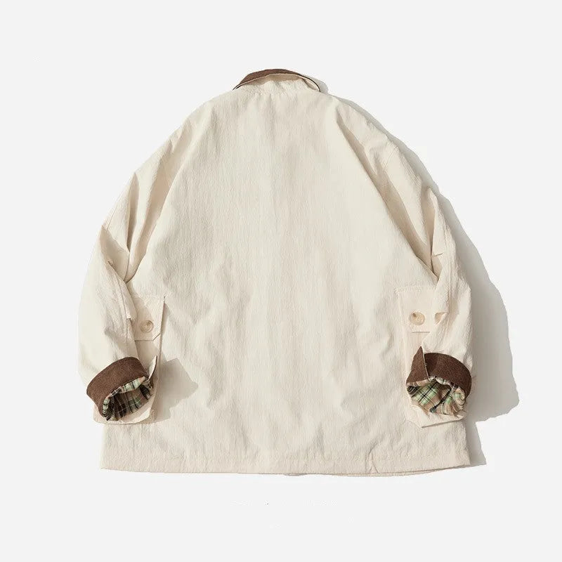 Green casual polyester jacket with side seam pockets on a person, showing front view