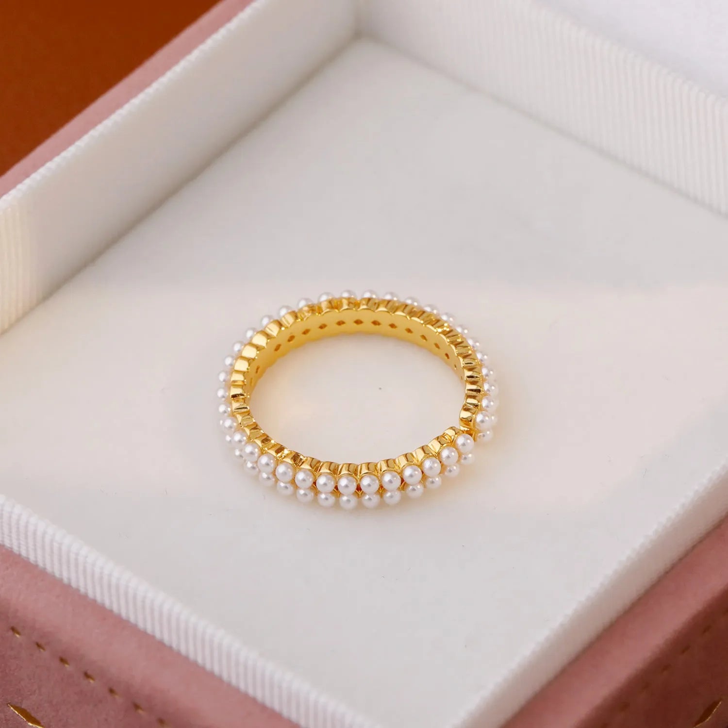Gold geometric women's ring with open mouth design and round pearl element