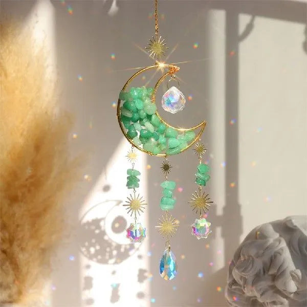 Metal and K9 crystal moon pendant for car rearview mirror in blue.