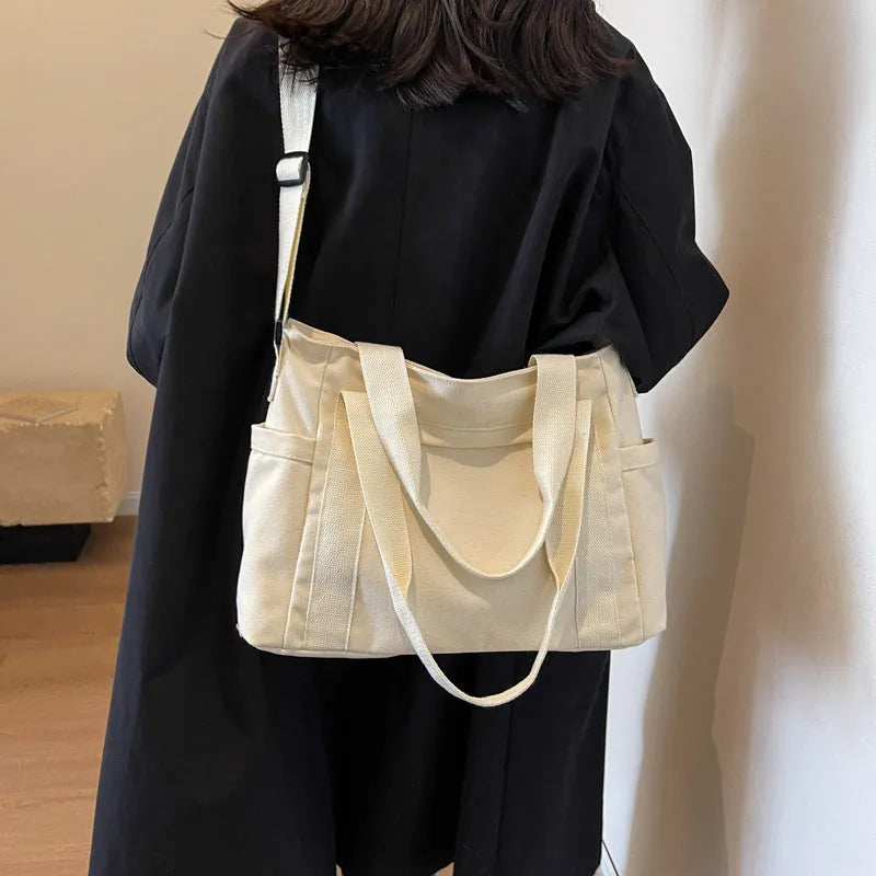 Women's solid colour polyester canvas shoulder bag with sandwich pockets and mobile phone compartment
