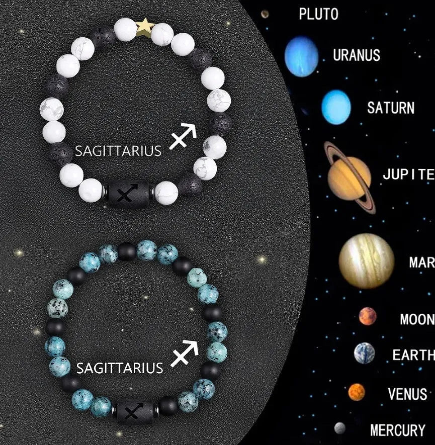 Two adjustable natural stone bead bracelets showing zodiac sign designs on a wooden surface.