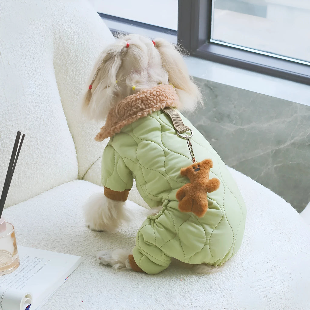 Light green cotton pet clothing with extra thick band and toy bear pendant on a dog