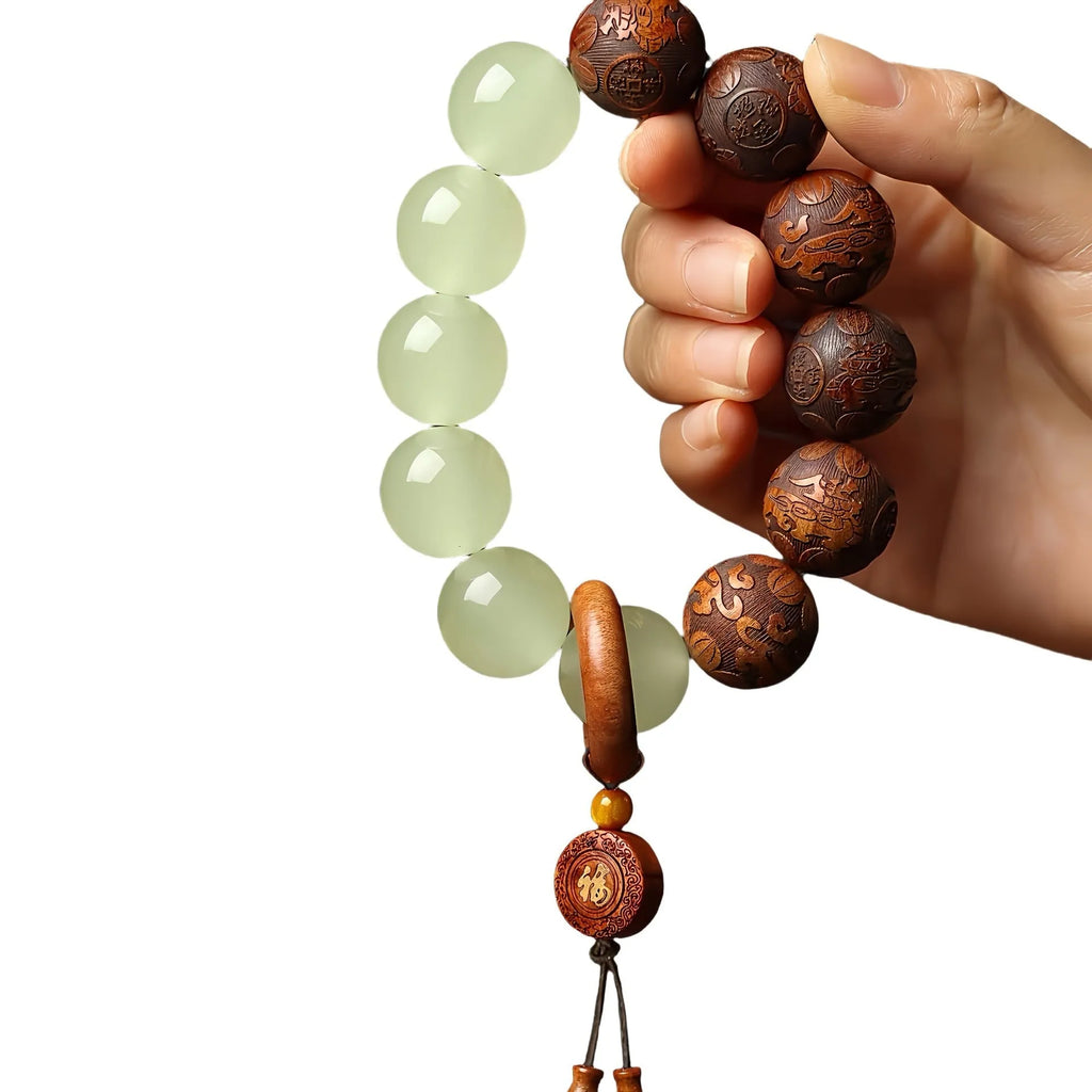 Rosewood bracelet with carved Fu character and amass fortunes motif on 20mm beads