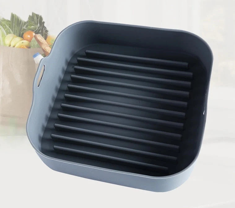 Reusable silicone air fryer liner in various colours, heat resistant up to 450°F