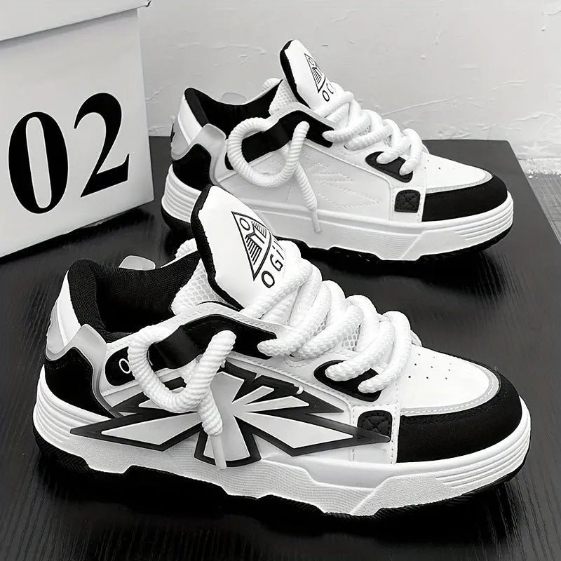 Men's white chunky sneakers with a cartoon totem pattern, thick rubber sole, and lace-up closure.