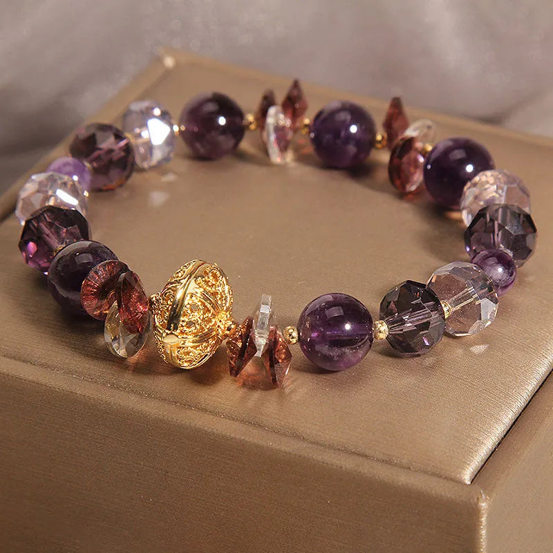 Purple crystal bracelet with pumpkin lucky beads and rhinestone wind chimes design for women.