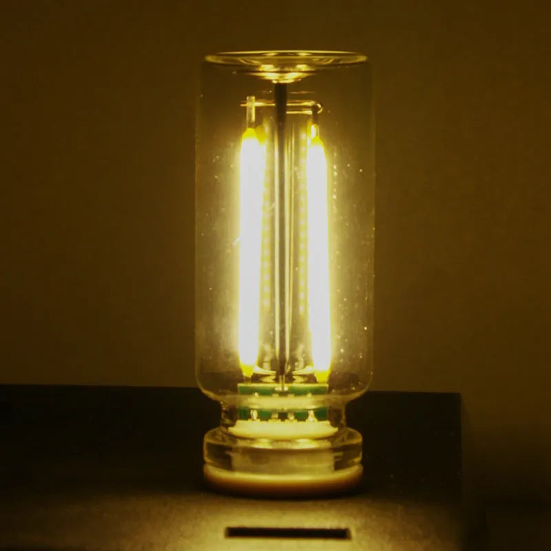RX9001 transparent glass USB touch night lamp showing compact size and modern design.