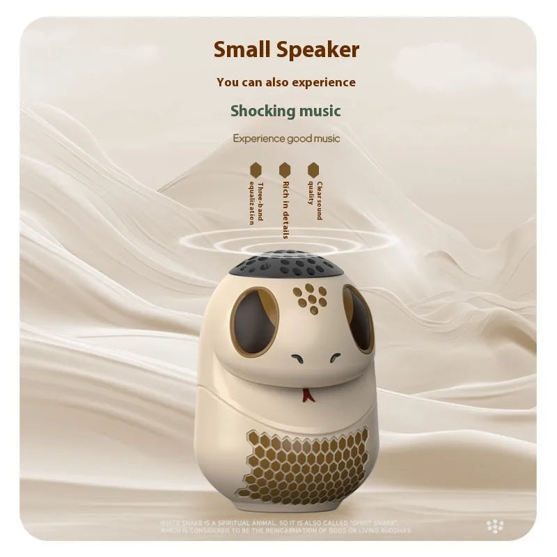 TK900 white cartoon Bluetooth speaker with lighting effects showing waterproof construction