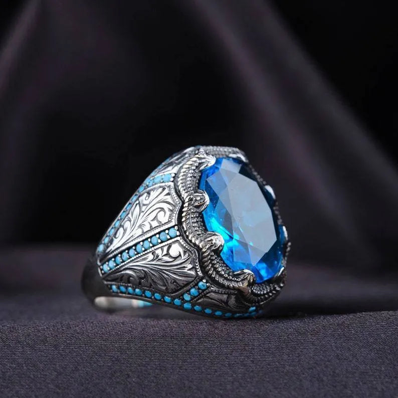 Antique silver geometric couple ring with blue zircon stone centrepiece showing European and American styling