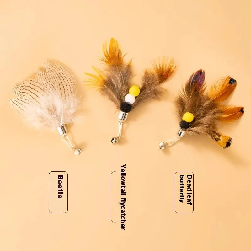 Three steel wire cat toy replacement heads with small flying insect designs in assorted colours.