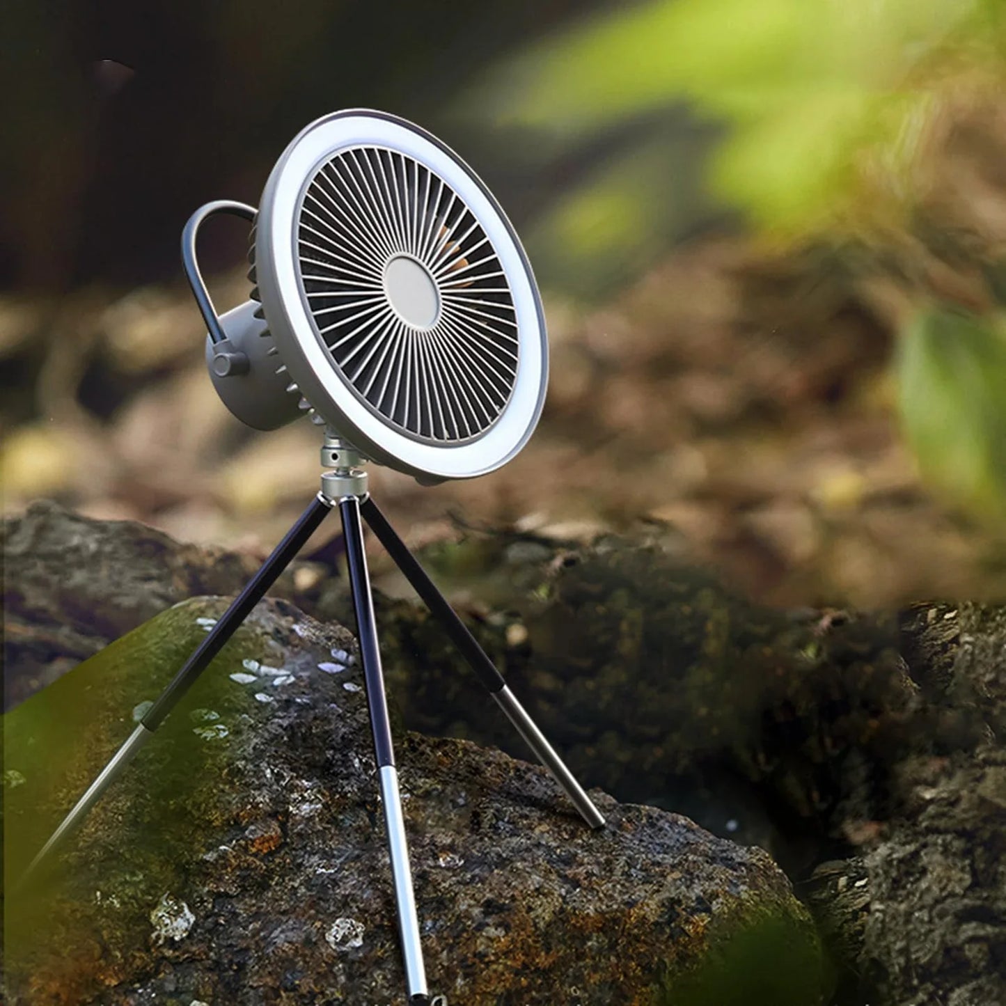 Versatile outdoor camping fan with portable USB rechargeable tripod design, multi-purpose functionality, and powerful 10,000mAh battery