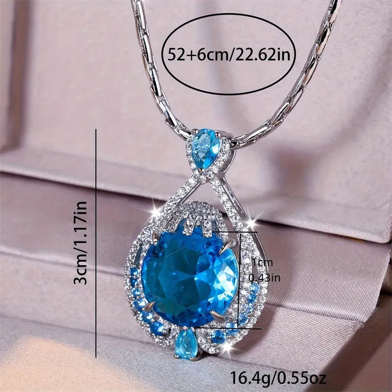 Blue crystal geometric necklace with fireworks cut gemstone on water wave chain