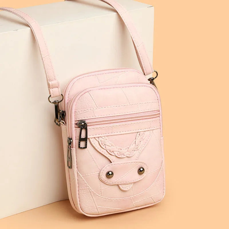 Soft PU retro mobile phone bag in vertical square shape with weaving and rivet details.