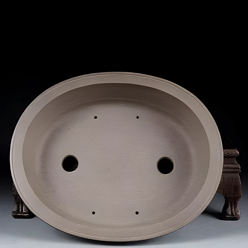 Handmade antique oval purple sand clay bonsai pot showing shallow 25cm length and 21cm width.