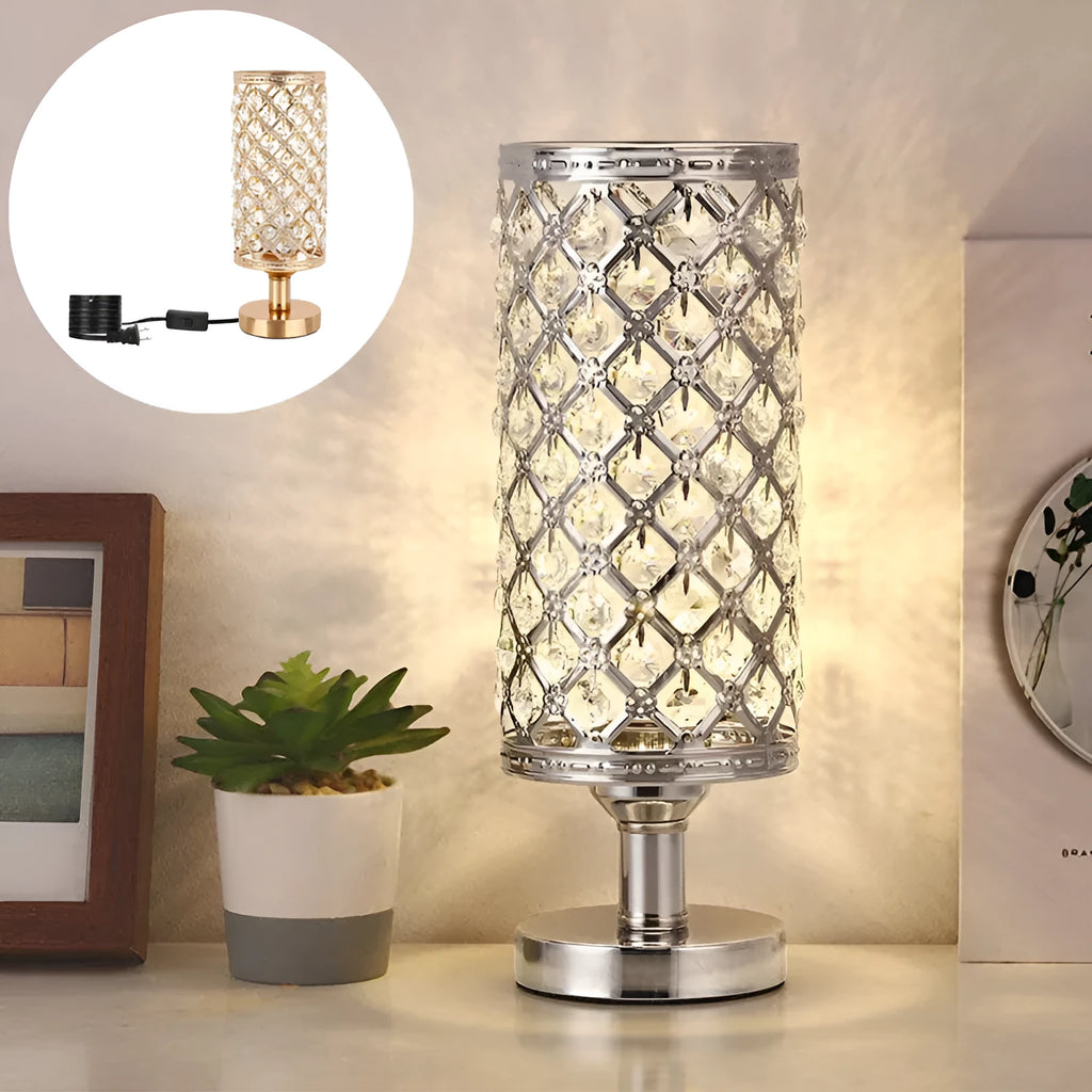 Modern crystal table lamp with metal base and hollow-carved shade in gold finish