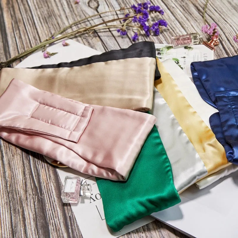 Mulberry silk sleep eye mask shown in champagne gold colour on a soft background.