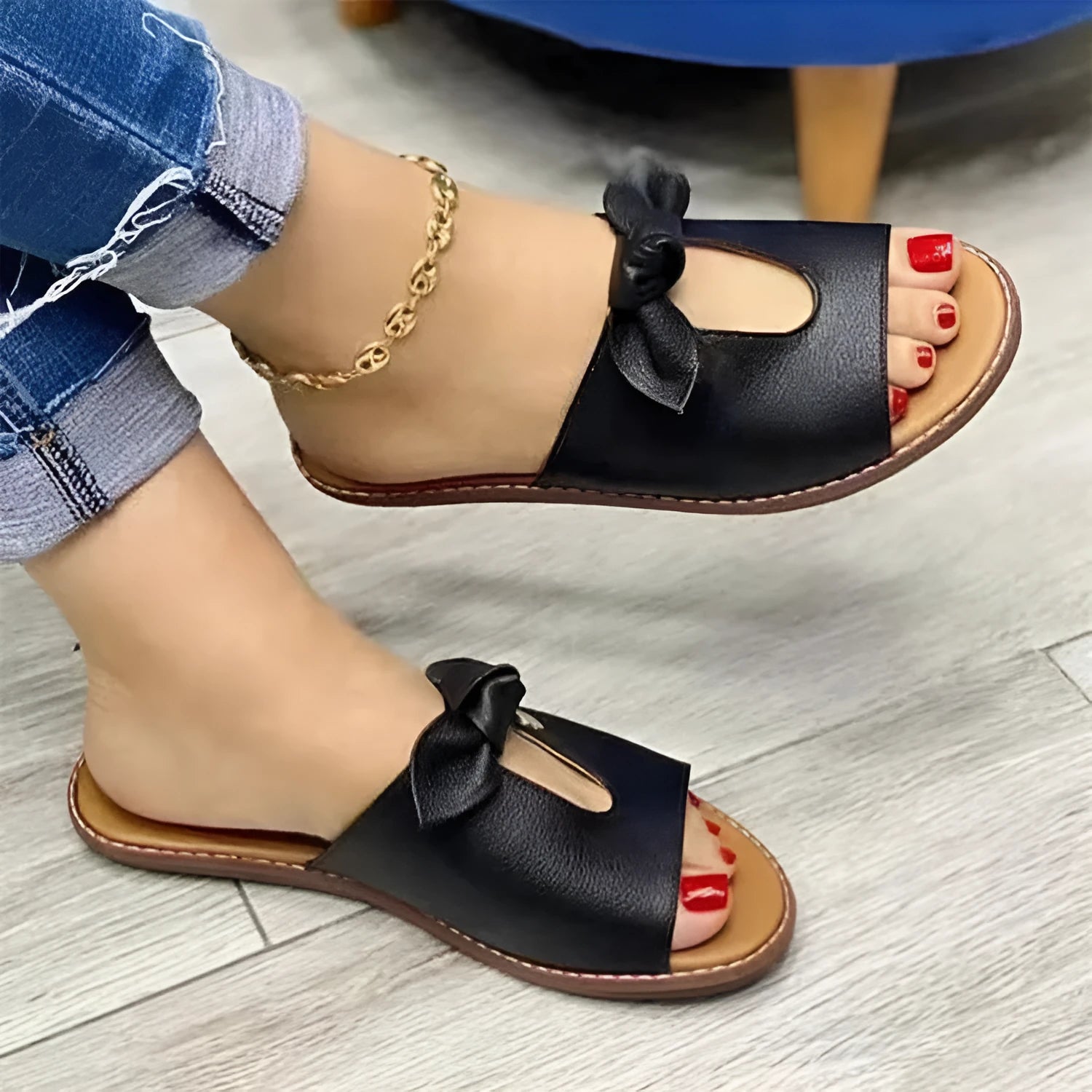 Ladies casual sandals with fish mouth design and a bow on the upper, in black, pink, or gold.