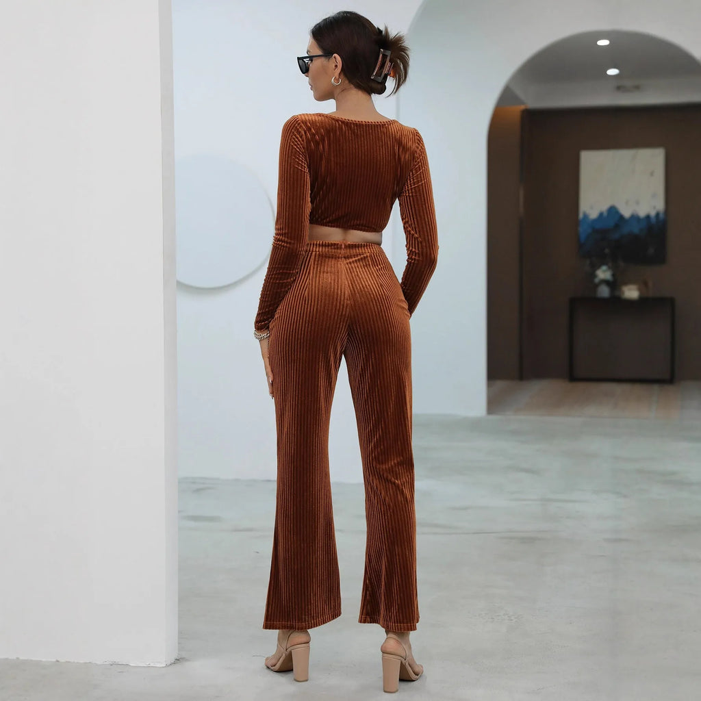 Caramel coloured long sleeve sweater and trouser casual set laid flat