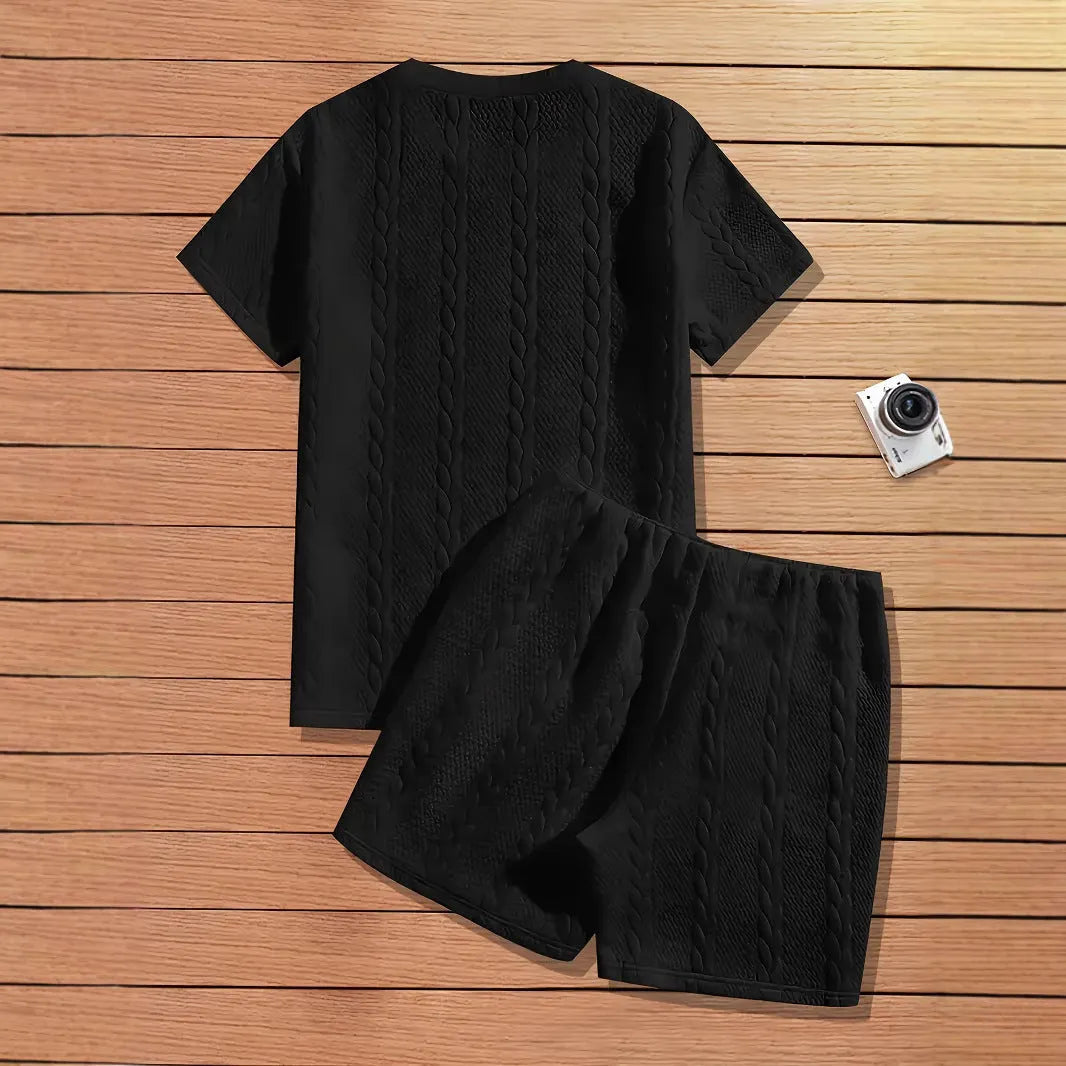Men's black sports two-piece set with ribbed short sleeves and matching shorts