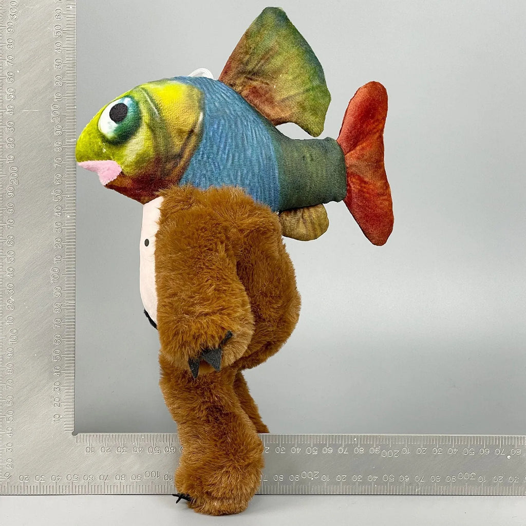 Assorted shark figurine hybrid plush toys including crocodile bomber and fish head orangutan designs.