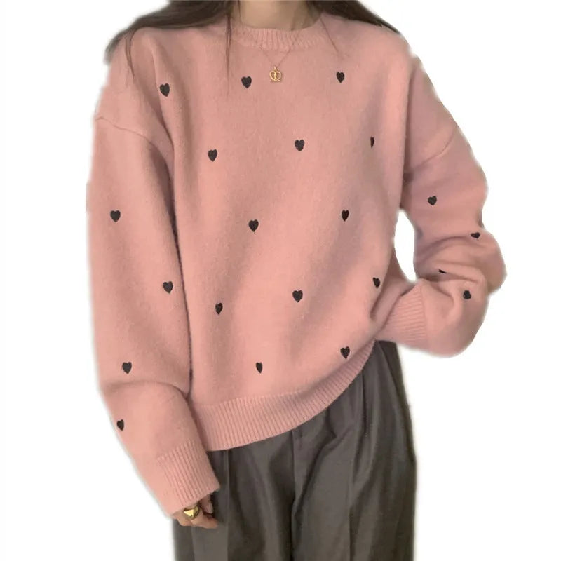 Beige loose-fit women's acrylic pullover sweater with long sleeves and chest embroidery.
